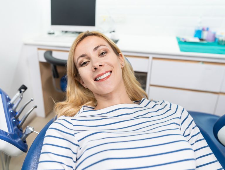 Patient receiving root canal therapy in a modern dental office in Huntington Beach